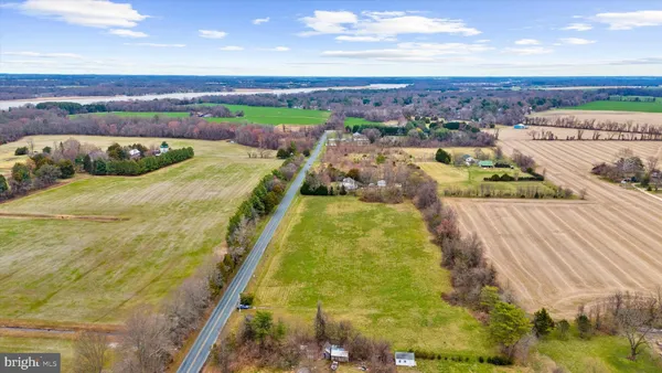 a view of an swimming pool and an outdoor seating