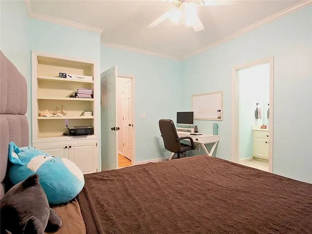 a spacious bathroom with a tub shower and sink