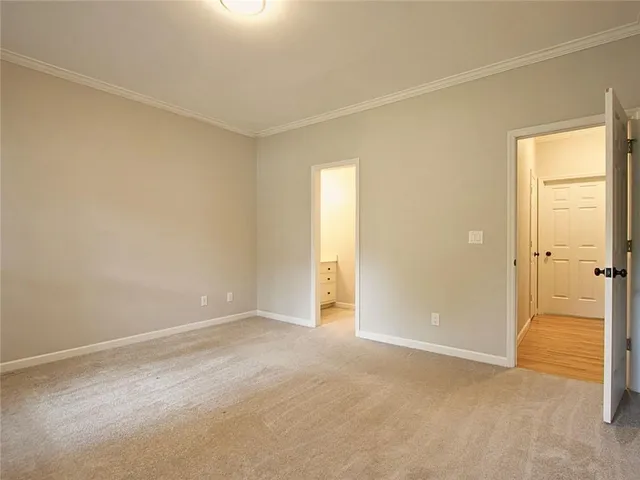 a front view of a house with large windows