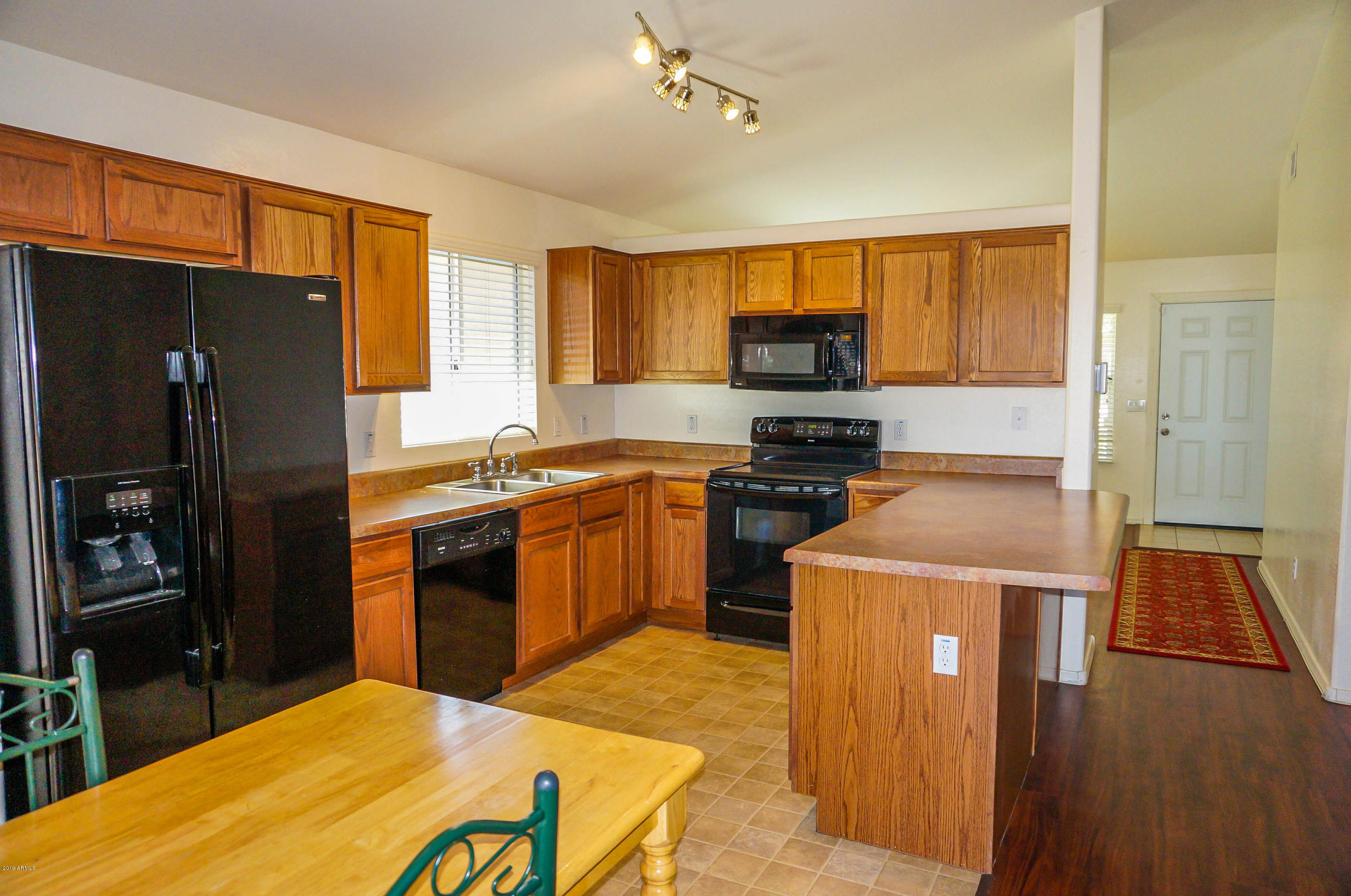 2714 West Pecan Road Phoenix, AZ 85041 - Photo 4 of 17 Kitchen towards from door