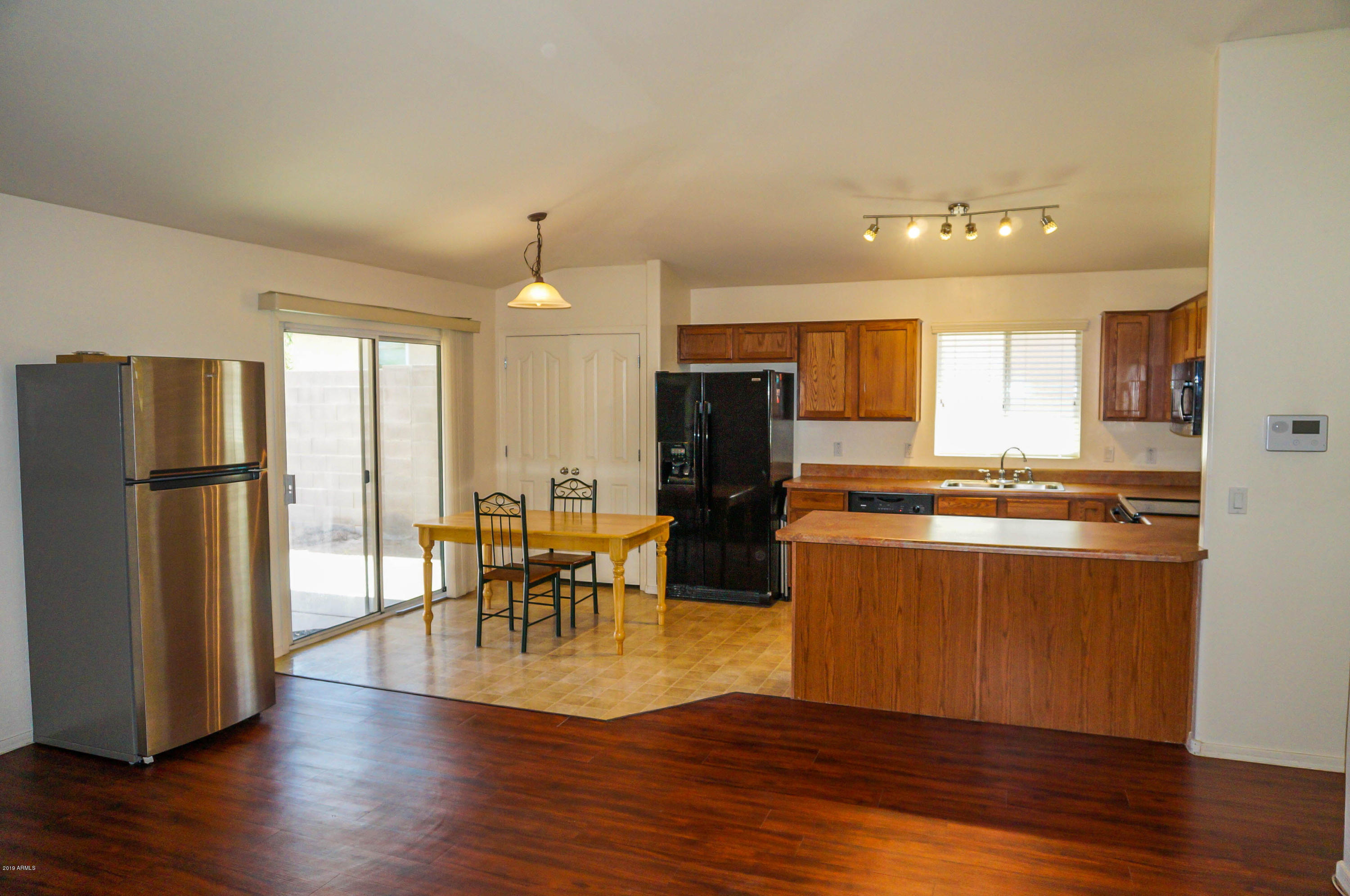 2714 West Pecan Road Phoenix, AZ 85041 - Photo 5 of 17 Living Room toward Kitchen