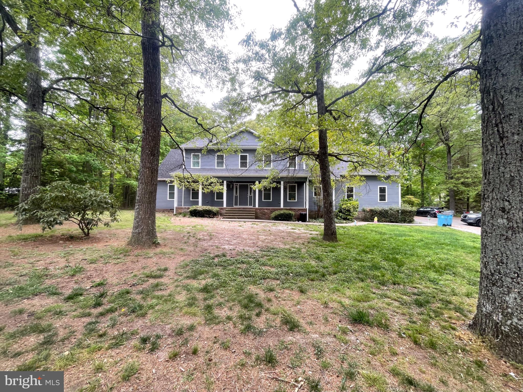 3824 Coulbourn Mill Road Salisbury, MD 21804 - Photo 3 of 60 Charming home nestled in lush greenery.
