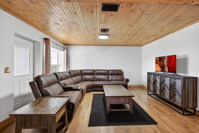 a bedroom with a bed and a walk in closet