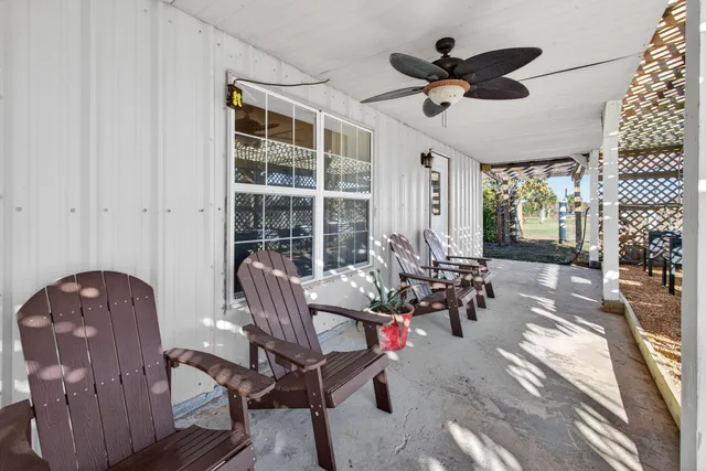 a view of a porch with a bench