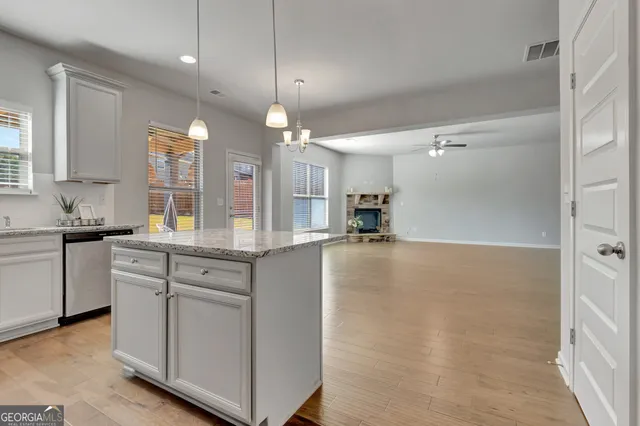a large kitchen with cabinets