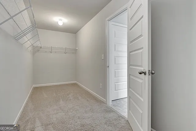 a bathroom with a bathtub and a sink