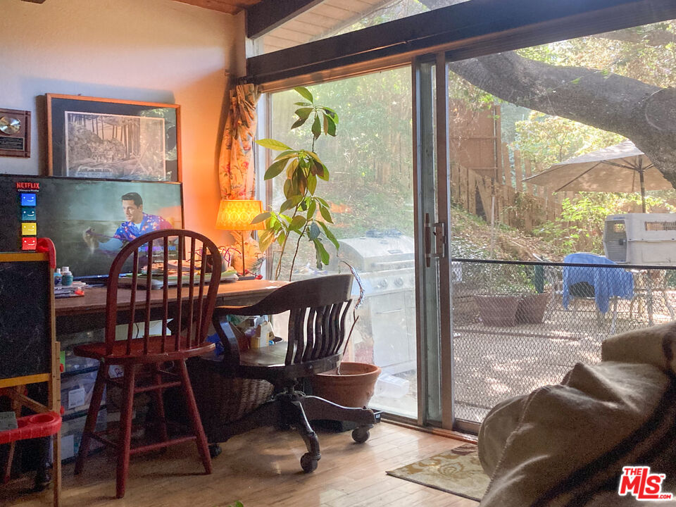 25614 Timpangos Drive Calabasas, CA 91302 - Photo 5 of 21 a view of a dining room with furniture window and wooden floor