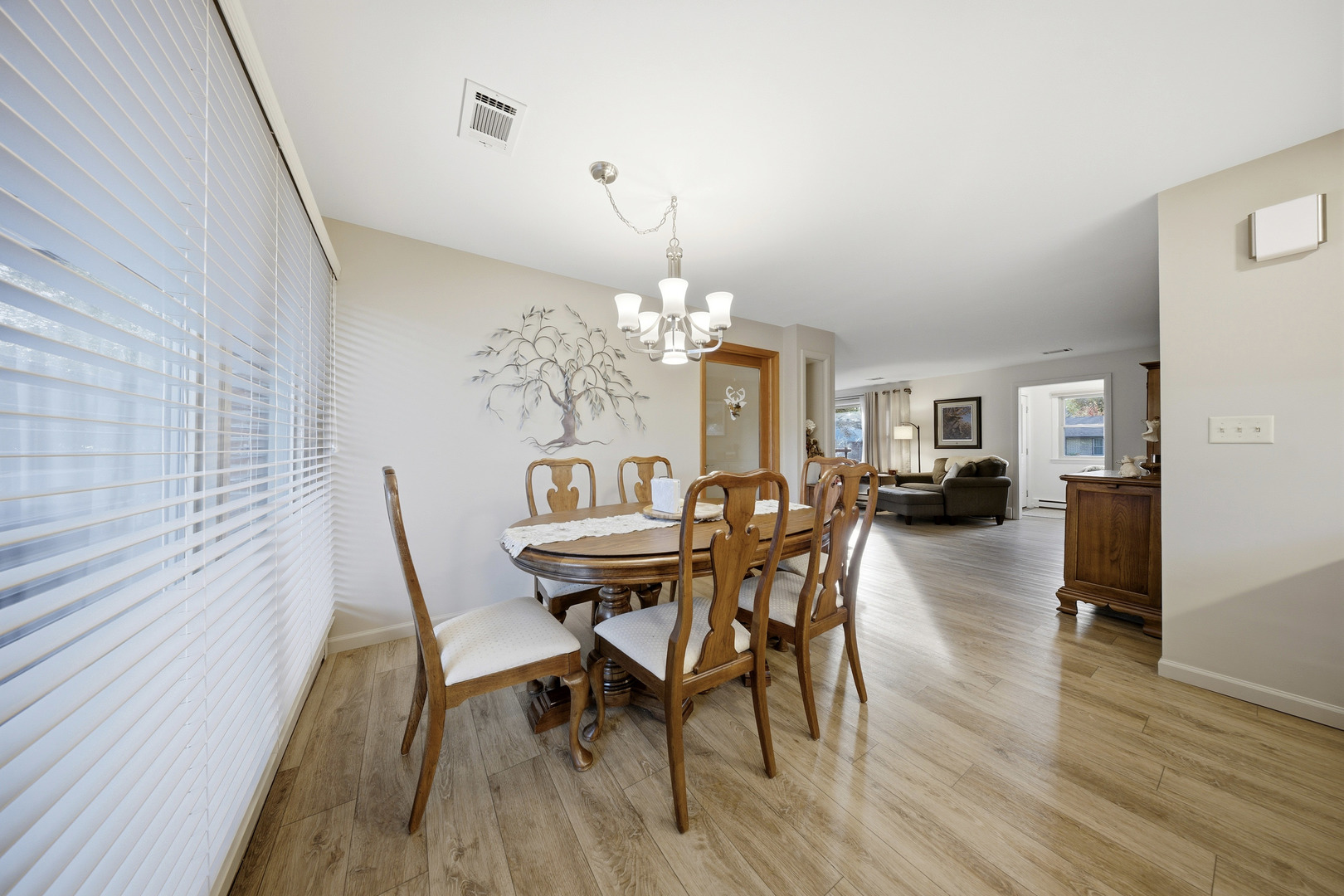 1360 Florence Drive Sycamore, IL 60178 - Photo 20 of 48 a view of a dining room with furniture and wooden floor
