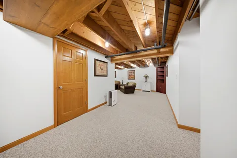 a view of a room with wooden walls