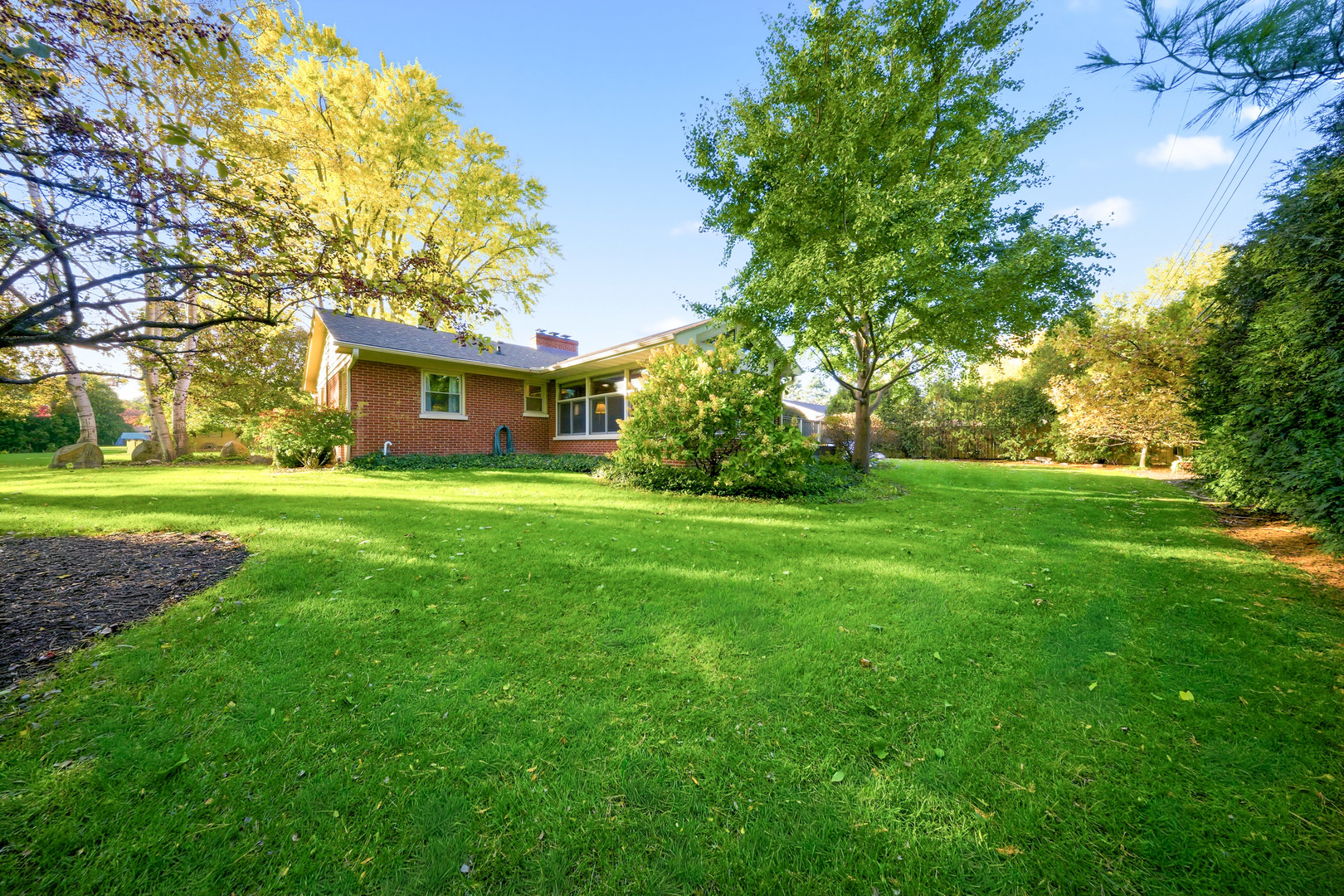 1360 Florence Drive Sycamore, IL 60178 - Photo 4 of 48 a view of house with a big yard