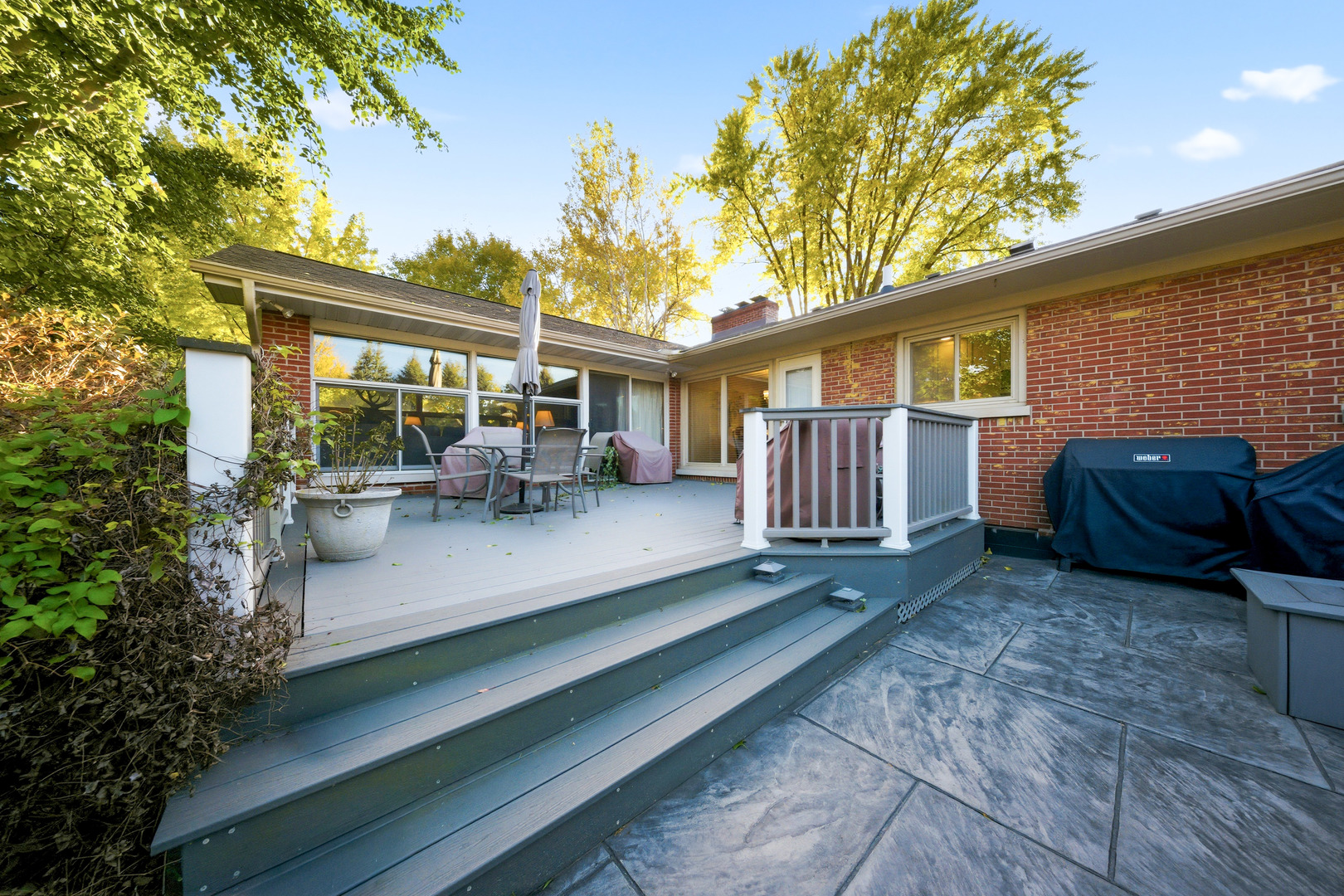 1360 Florence Drive Sycamore, IL 60178 - Photo 7 of 48 a view of a backyard with sitting area and furniture