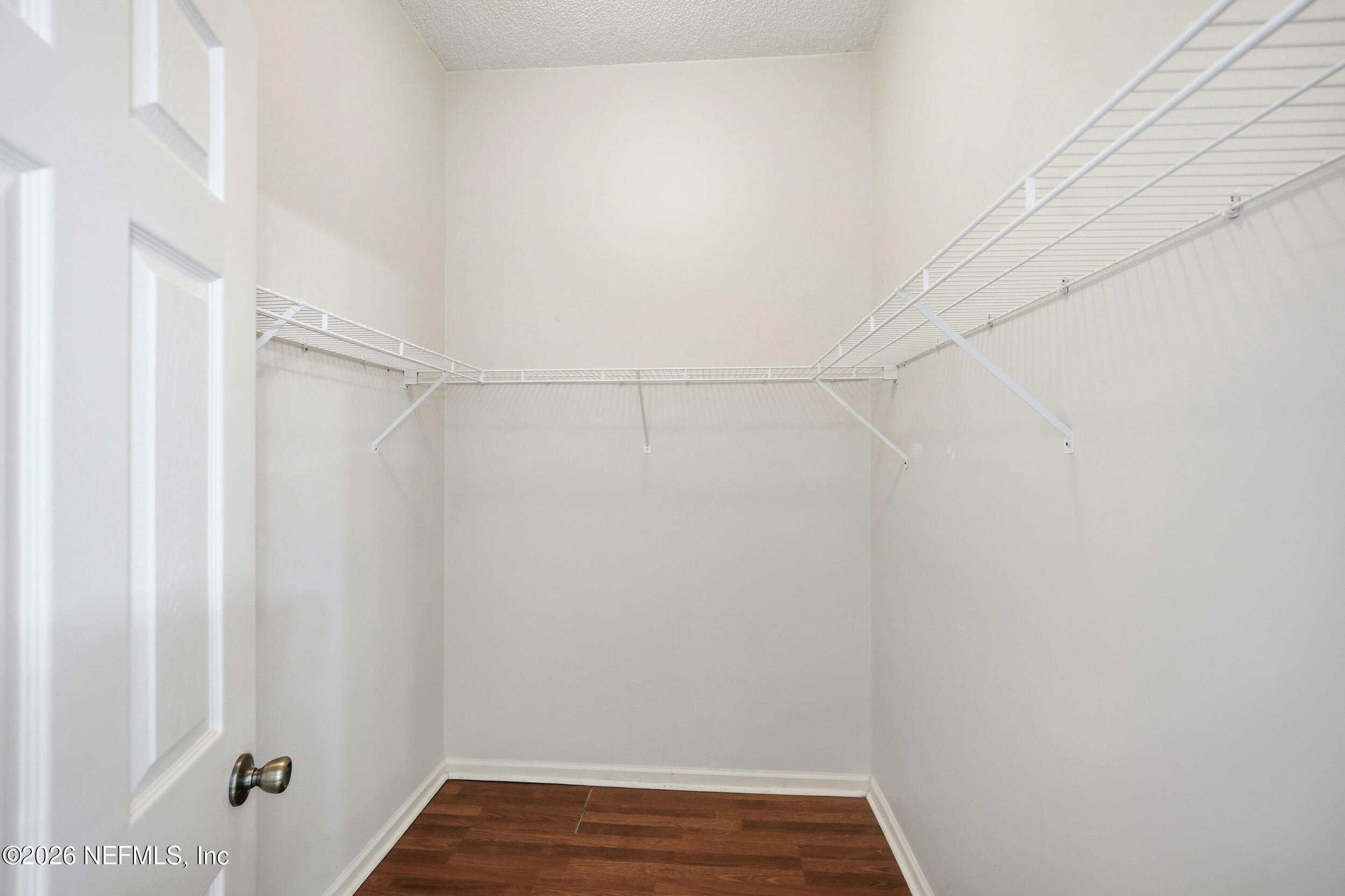 5019 Ripple Rush Drive North Jacksonville, FL 32257 - Photo 12 of 40 a view of a room with wooden floor