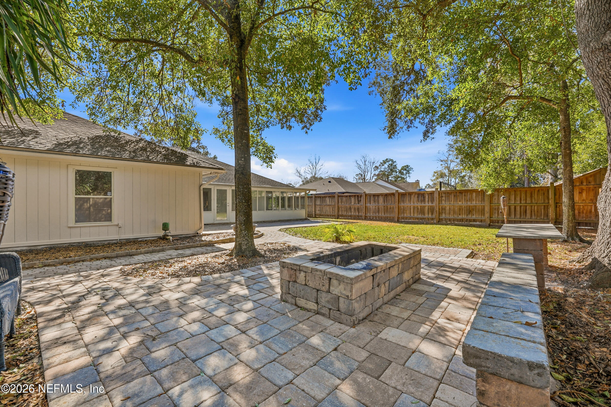 5019 Ripple Rush Drive North Jacksonville, FL 32257 - Photo 13 of 40 a view of a yard with swimming pool and furniture