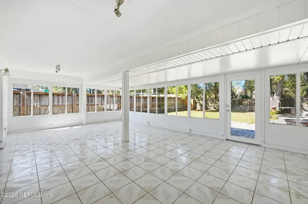 a view of an empty room and window