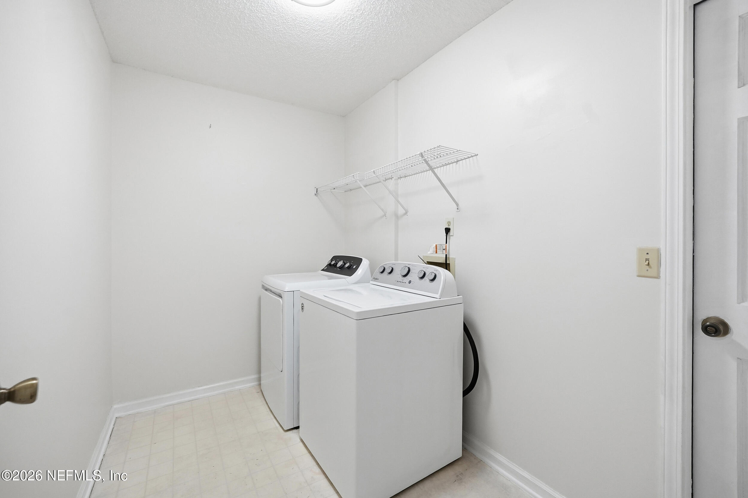 5019 Ripple Rush Drive North Jacksonville, FL 32257 - Photo 35 of 40 a utility room with dryer and washer