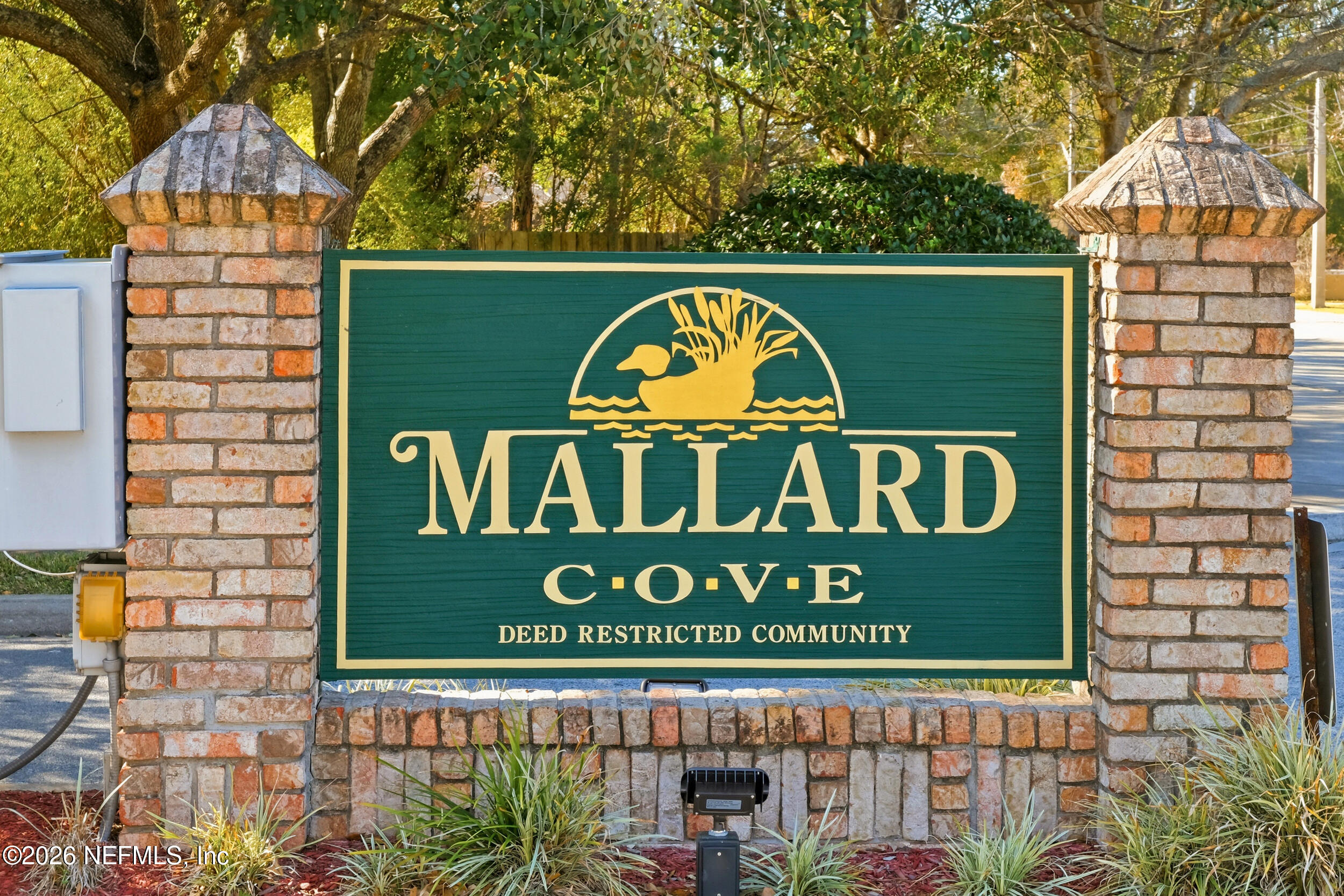 5019 Ripple Rush Drive North Jacksonville, FL 32257 - Photo 37 of 40 a sign that is on the side of a building