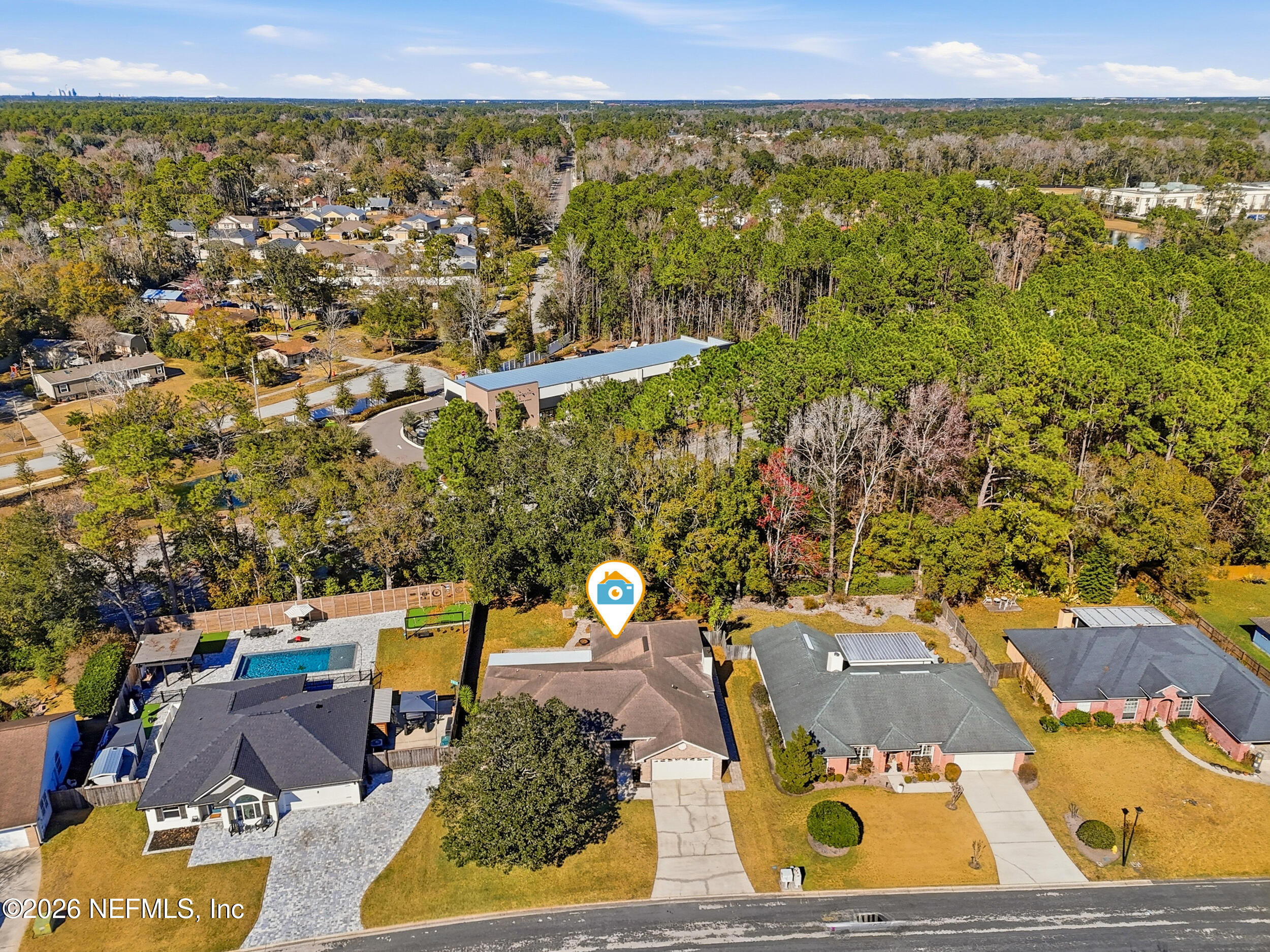 5019 Ripple Rush Drive North Jacksonville, FL 32257 - Photo 39 of 40 an aerial view of residential houses with outdoor space