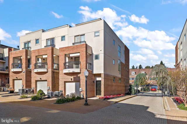 a city street lined with tall buildings
