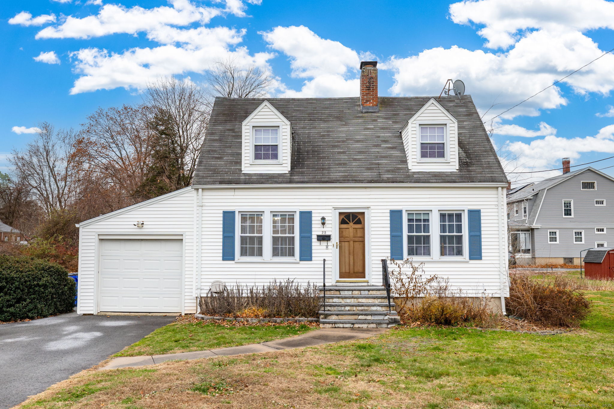 23 Highview Avenue Wethersfield, CT 06109 - Photo 1 of 1 a front view of a house with a yard and garage