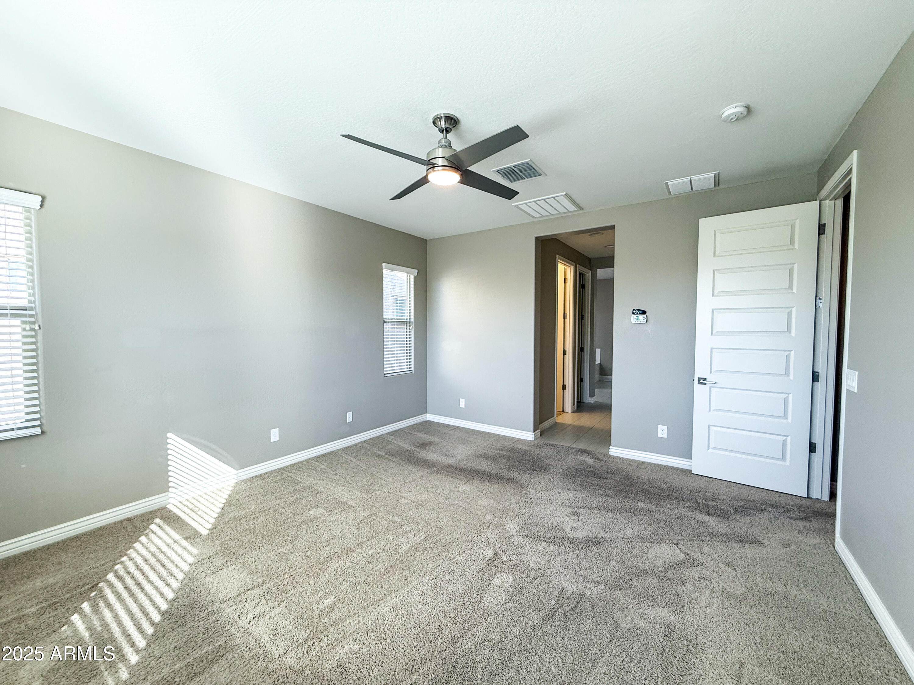 4711 East Daley Lane Phoenix, AZ 85050 - Photo 26 of 43 a view of an empty room with a window