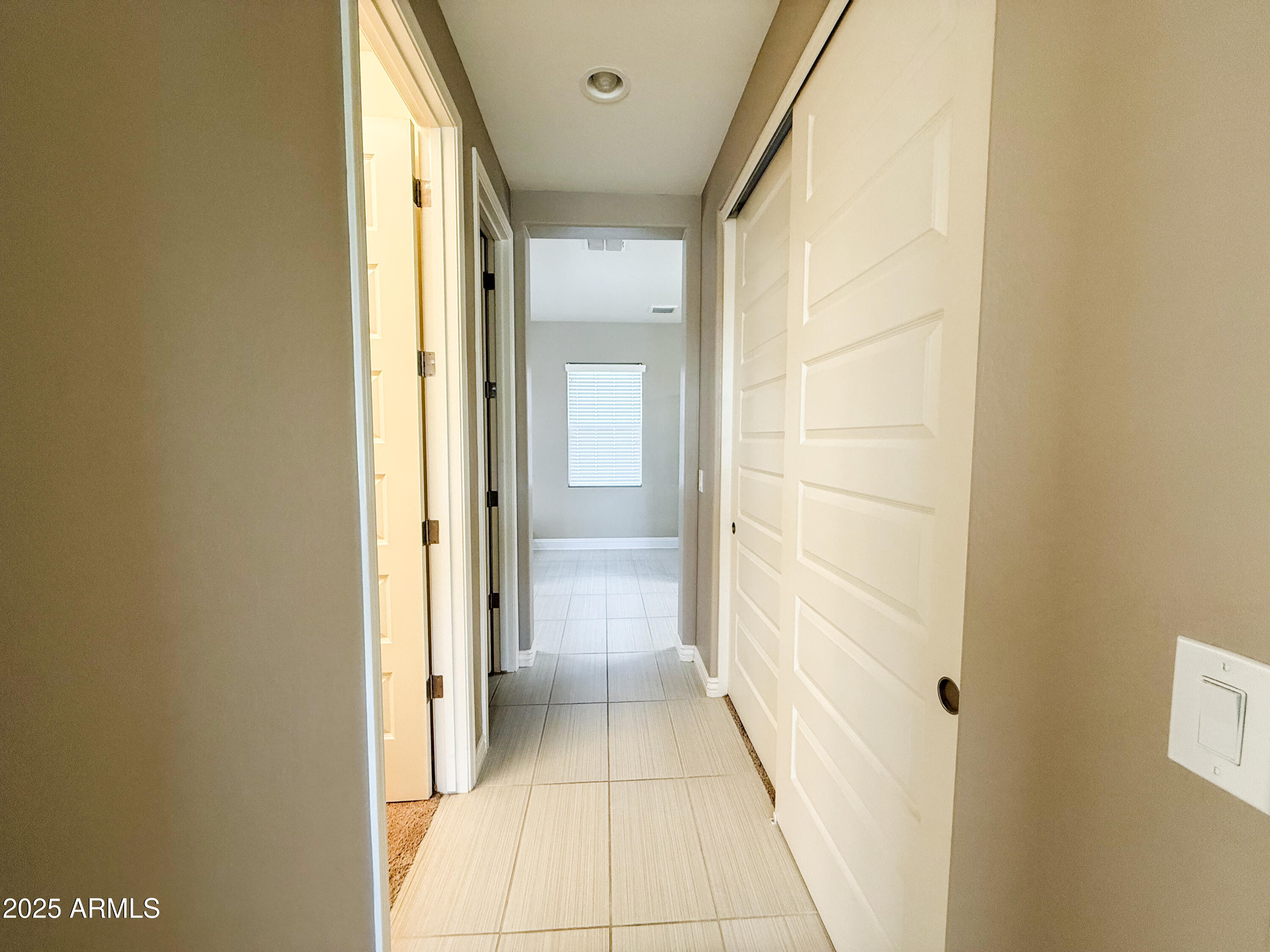 4711 East Daley Lane Phoenix, AZ 85050 - Photo 27 of 43 a view of a bathroom from a hallway