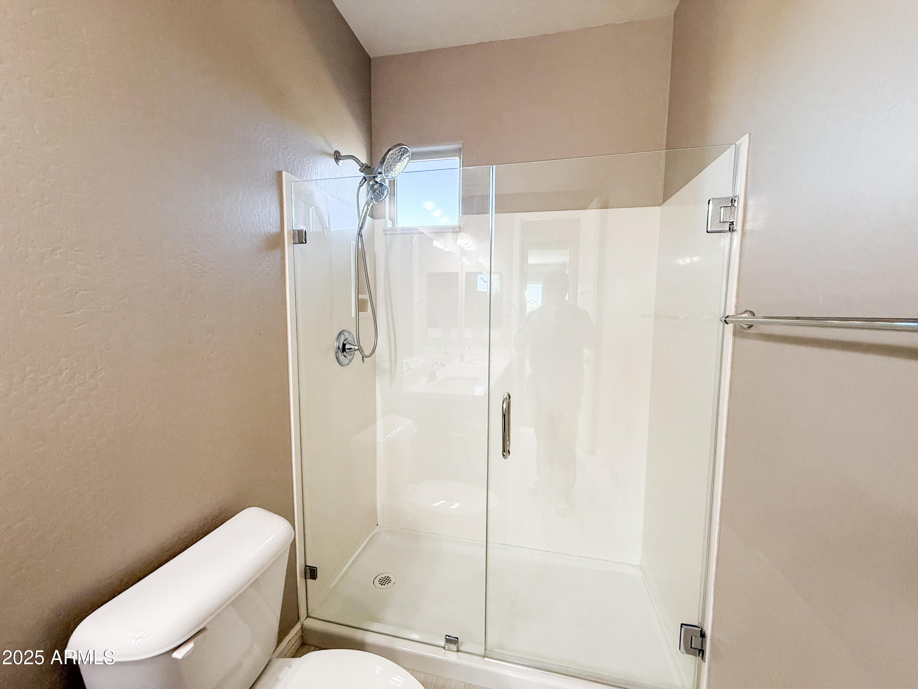 4711 East Daley Lane Phoenix, AZ 85050 - Photo 37 of 43 a white toilet sitting next to a bathroom