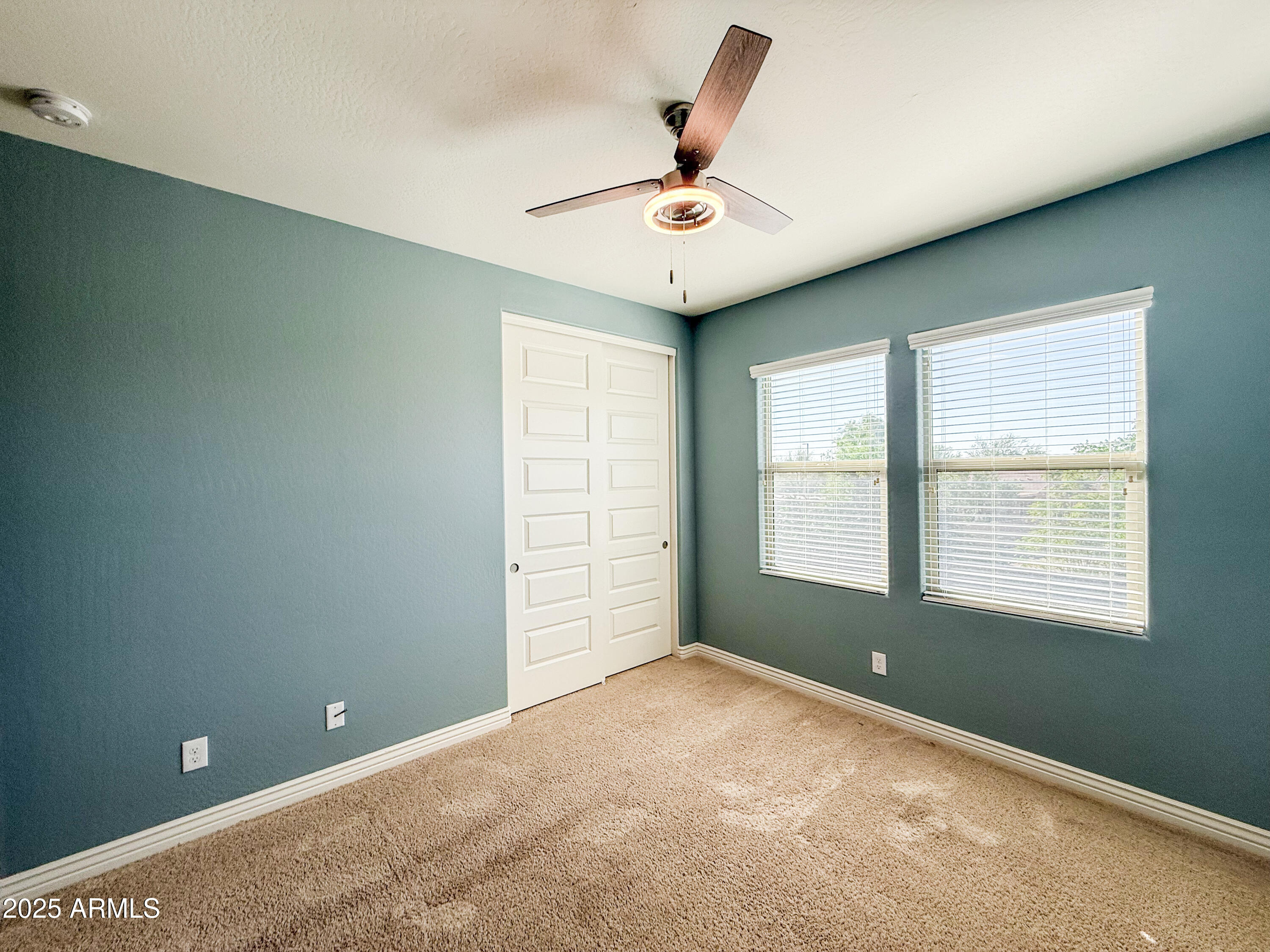 4711 East Daley Lane Phoenix, AZ 85050 - Photo 40 of 43 a view of an empty room with a window