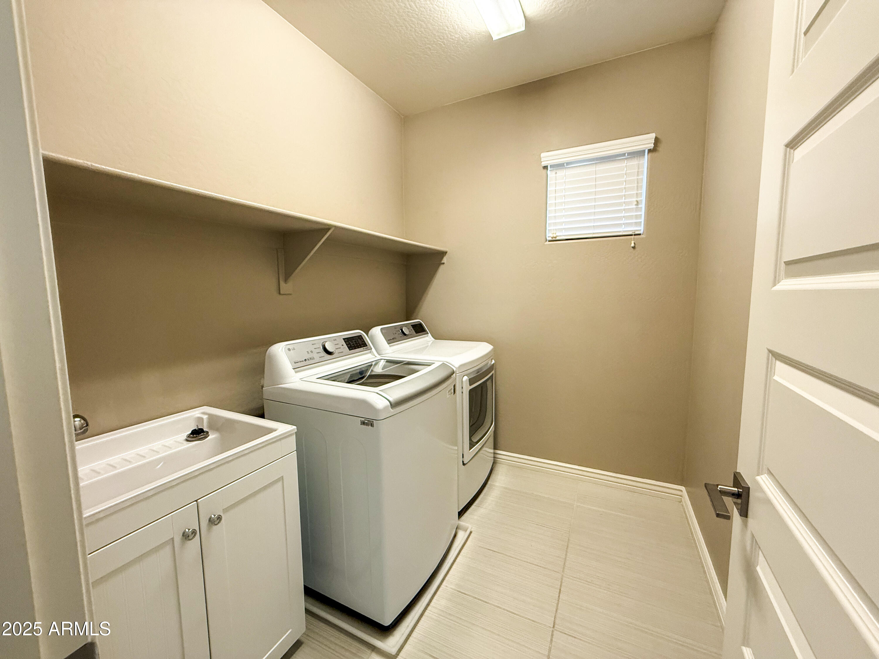 4711 East Daley Lane Phoenix, AZ 85050 - Photo 43 of 43 a utility room with dryer and washer