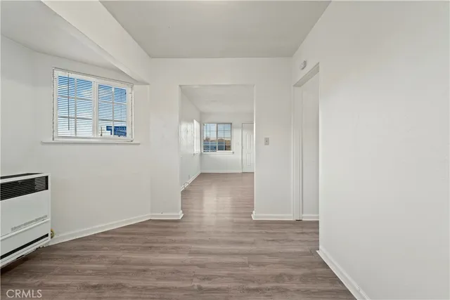 a view of livingroom with hardwood floor and hallway