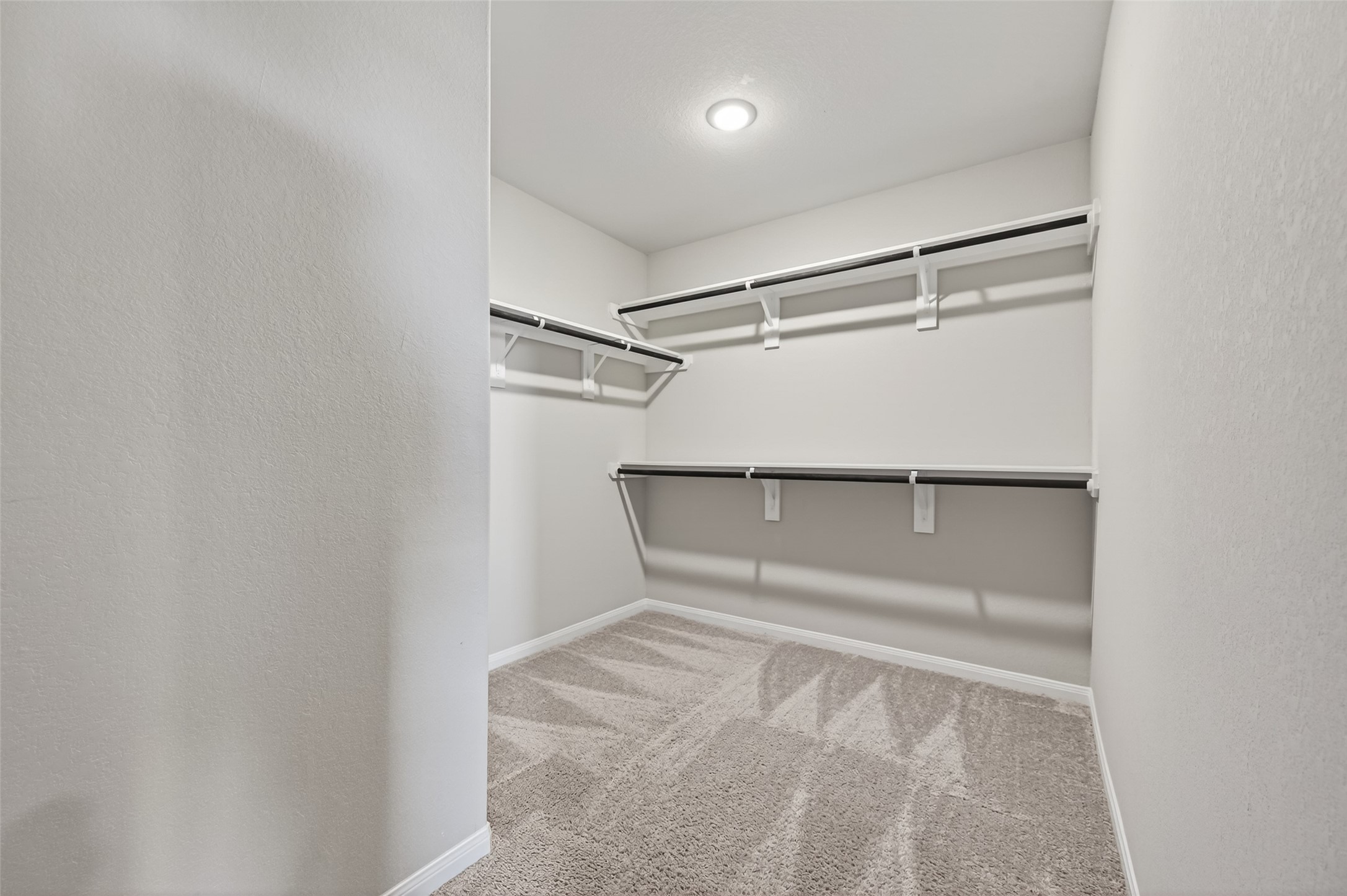 940 21st Street Hempstead, TX 77445 - Photo 21 of 32 a view of an empty walk in closet