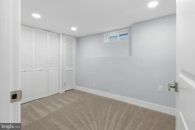 a bathroom with a sink a toilet and a tub