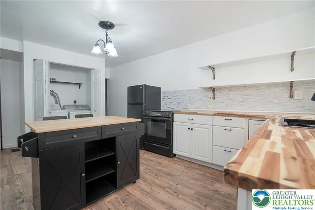 a bathroom with a sink and a window