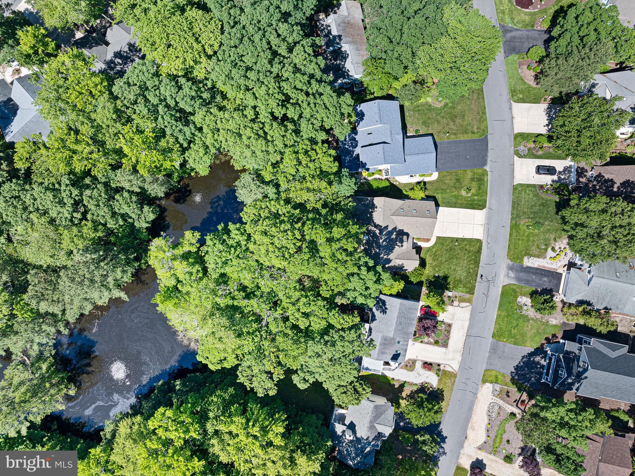 715 Foxtail Drive Bethany Beach, DE 19930 - Photo 2 of 63 Located on a Pond and backing to woods