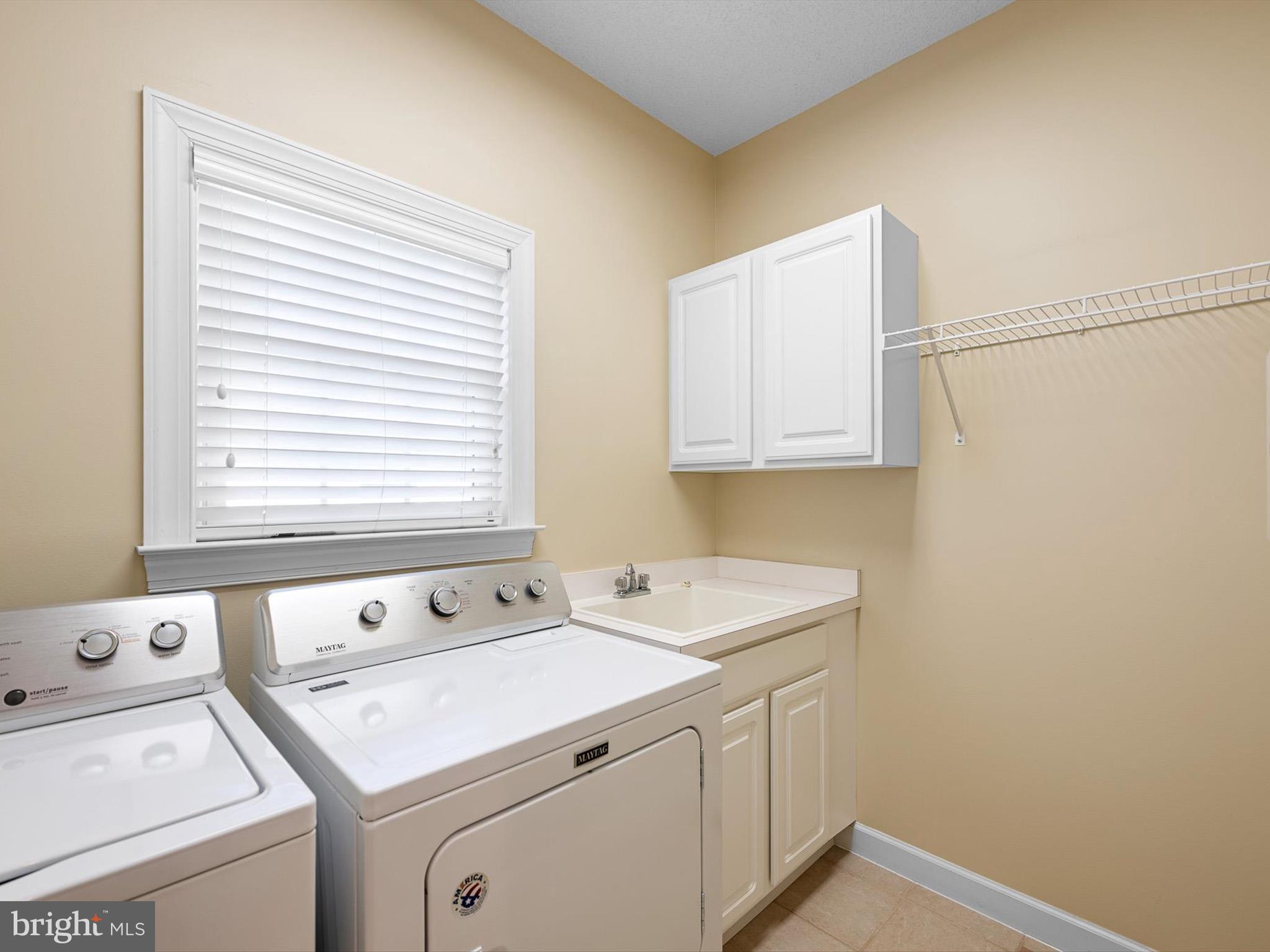 715 Foxtail Drive Bethany Beach, DE 19930 - Photo 24 of 63 Laundry Rm with Sink and Cabinets