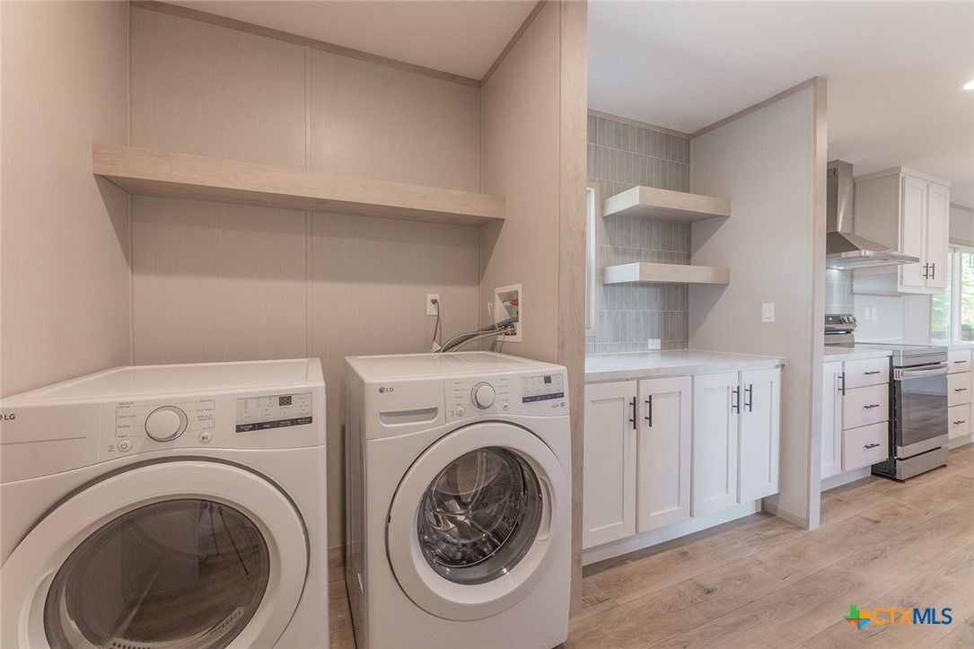 3505 Ivy Gap Road Kempner, TX 76539 - Photo 16 of 43 a utility room with dryer and washer