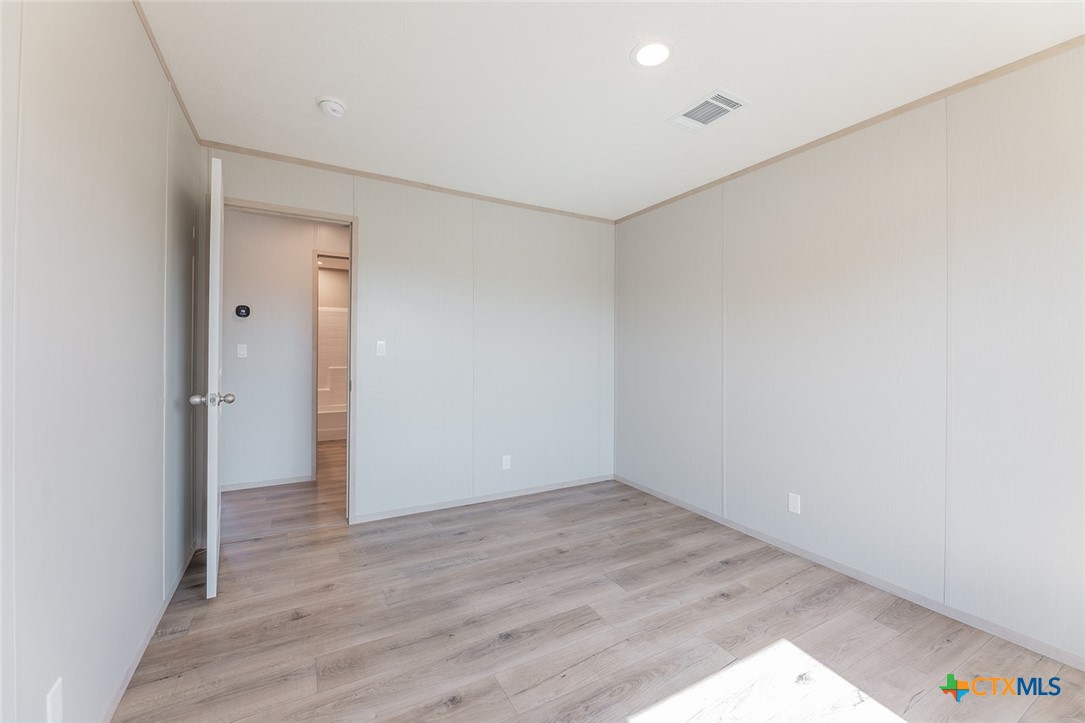 3505 Ivy Gap Road Kempner, TX 76539 - Photo 28 of 43 wooden floor in an empty room