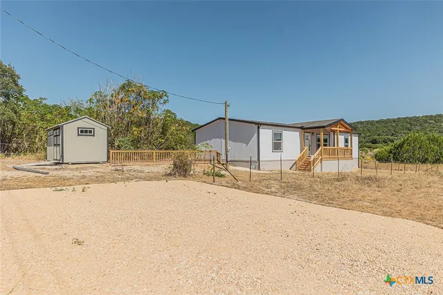 a view of a house with a snow