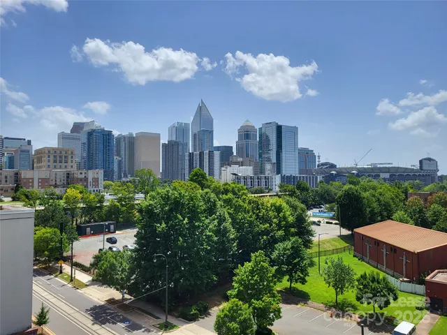 a view of a city with tall buildings