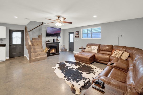 16033 Door Key Road San Angelo, TX 76904 - Photo 23 of 100 a living room with furniture and a fireplace