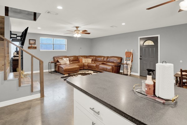 16033 Door Key Road San Angelo, TX 76904 - Photo 27 of 100 a living room with furniture and a flat screen tv