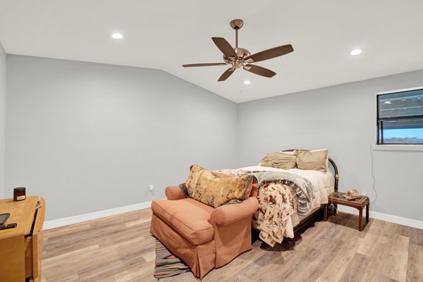 16033 Door Key Road San Angelo, TX 76904 - Photo 42 of 100 a bedroom with a bed and a couch