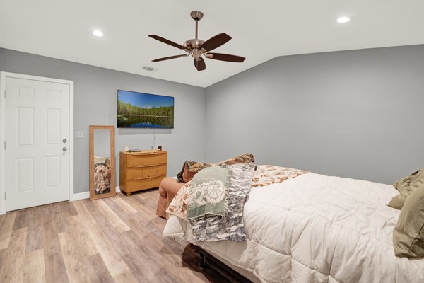 16033 Door Key Road San Angelo, TX 76904 - Photo 43 of 100 a bedroom with a bed and a flat screen tv