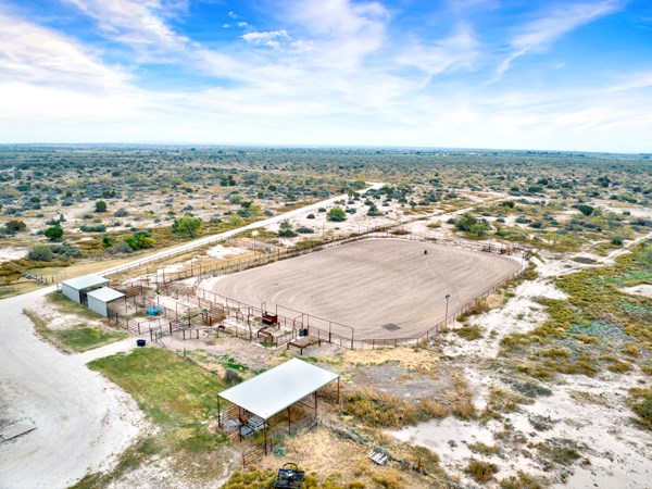 16033 Door Key Road San Angelo, TX 76904 - Photo 58 of 100 an aerial view of residential building and an ocean