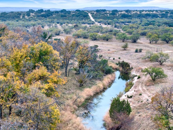 16033 Door Key Road San Angelo, TX 76904 - Photo 7 of 100 an aerial view of house with yard and mountain view in back