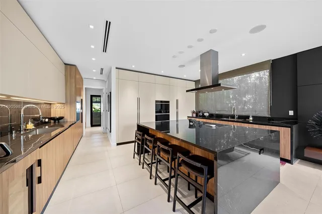 a bathroom with a bathtub and a mirror