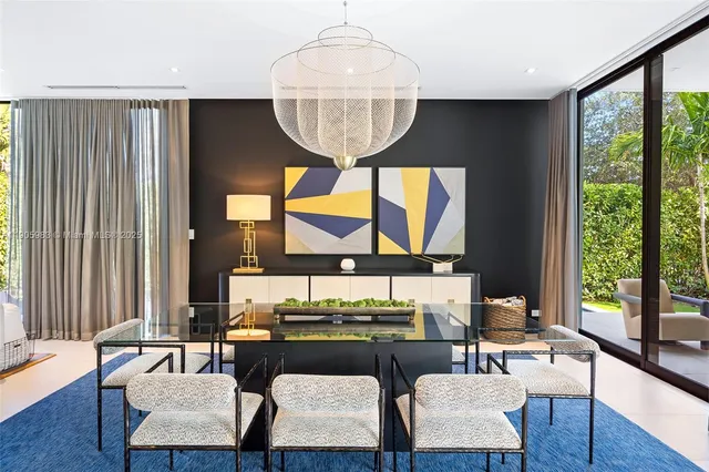 a bedroom with a large bed and a large window