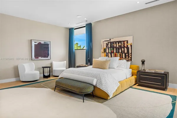 a bathroom with a sink toilet and mirror