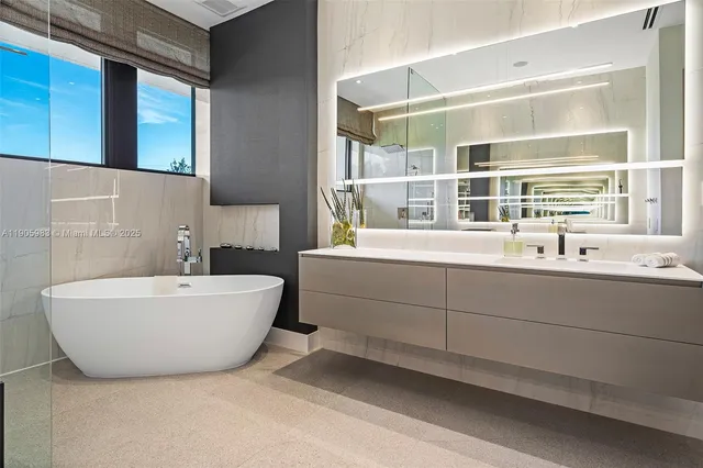 a kitchen with a sink a window and cabinets