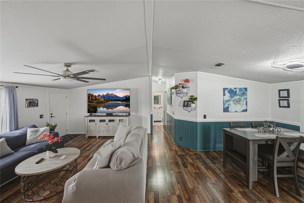 4695 Turner Road Mulberry, FL 33860 - Photo 12 of 51 a living room with furniture and a flat screen tv