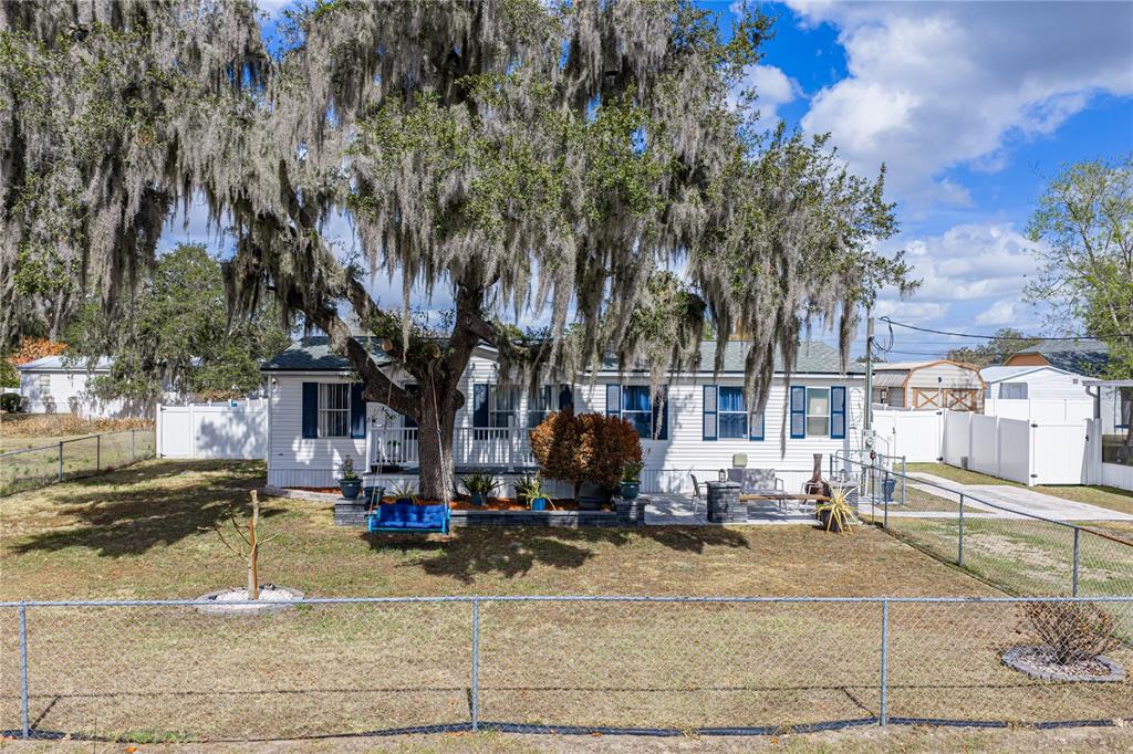 4695 Turner Road Mulberry, FL 33860 - Photo 2 of 51 a view of a street with houses